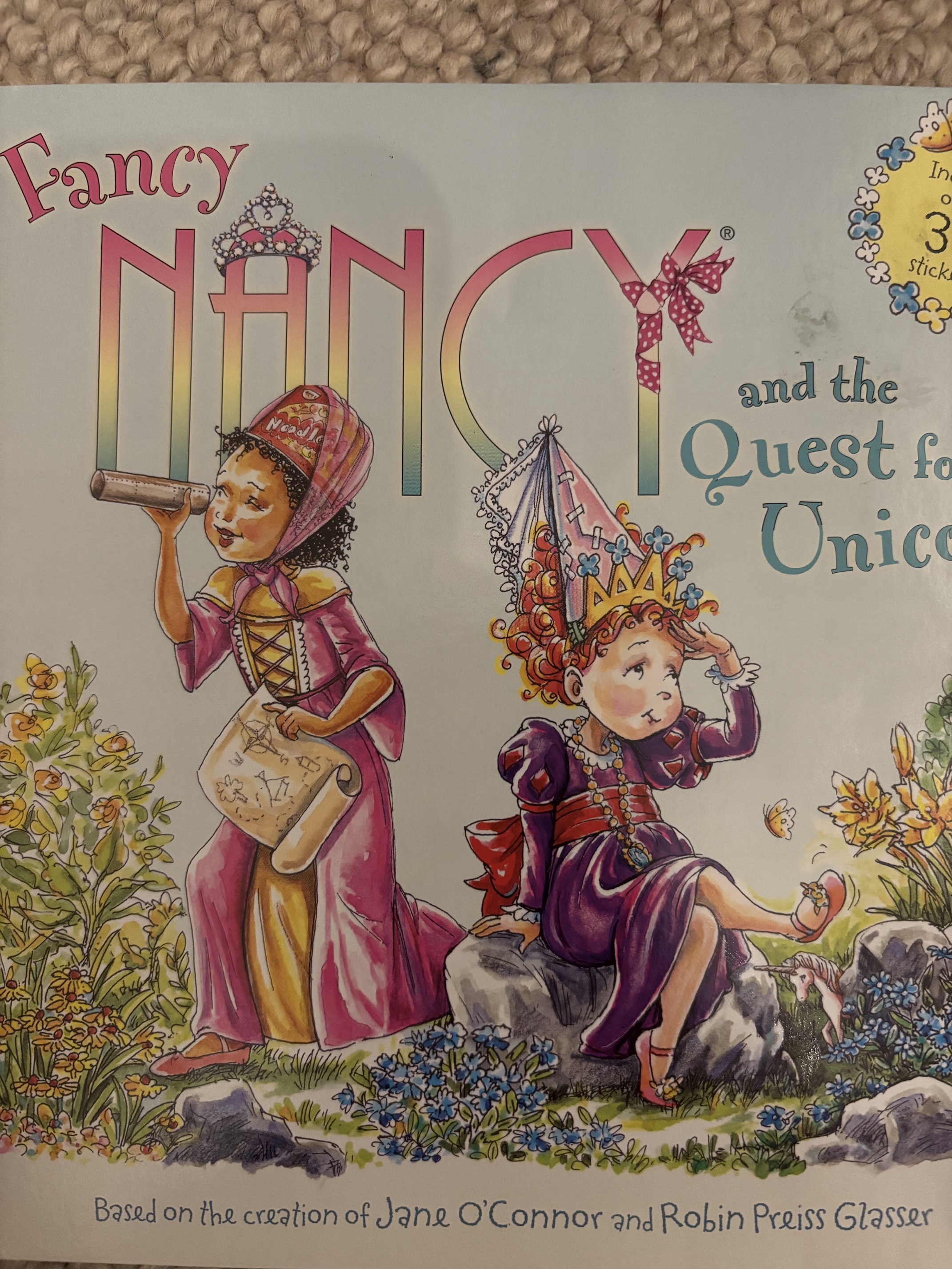 Layla with her favorite book Fancy Nancy by Robin Preiss Glasser.